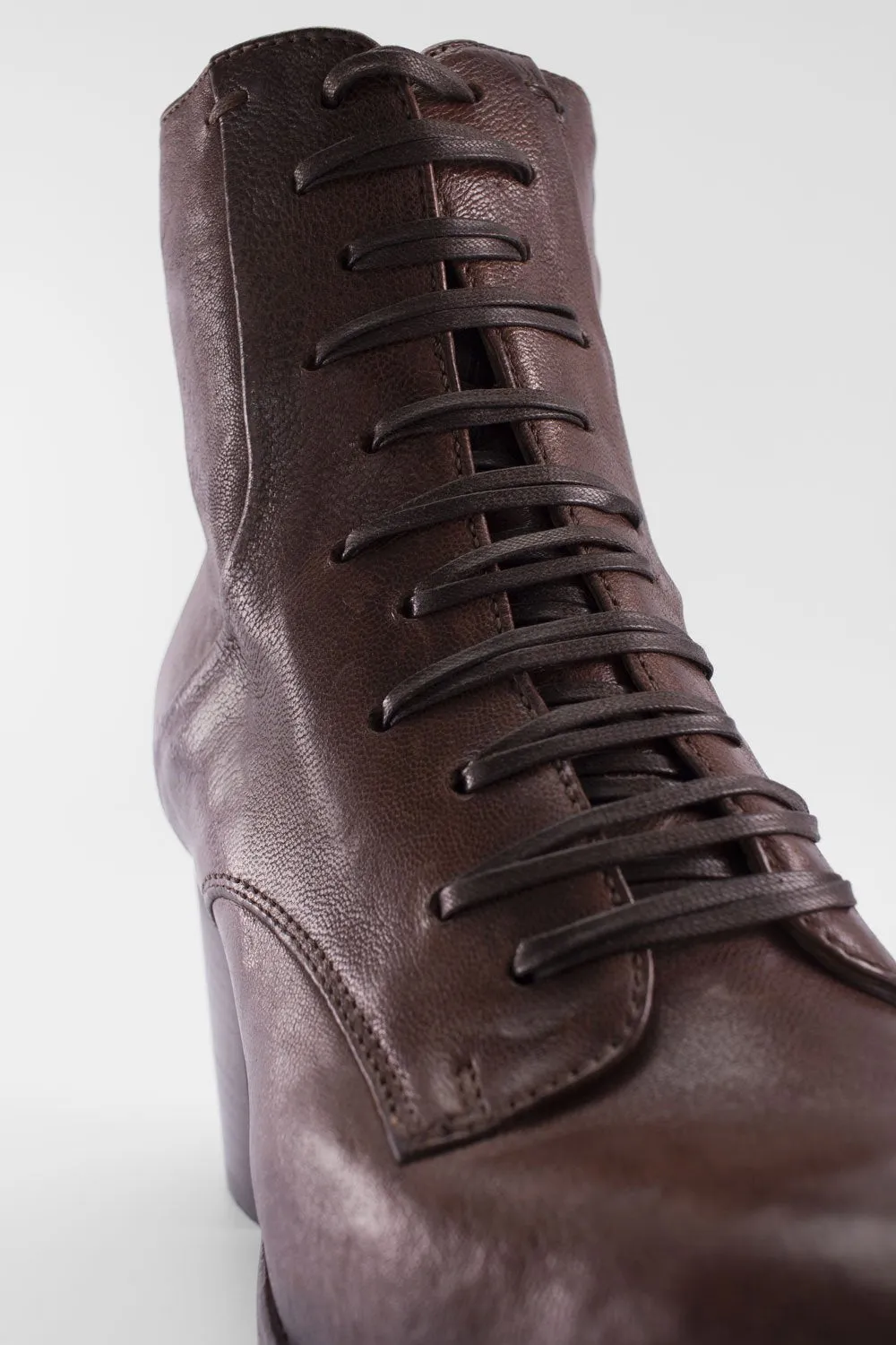 ASTON chocolate-brown lace up boots.